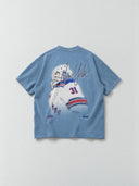 Monaco Social Club New-York Blur Tee in slate blue, back flat lay showing blurred goalie artwork and New-York script.