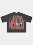 Black Monaco graphic tee back mockup with tiger artwork, red Monaco lettering and “Crafted for All Conditions” text.