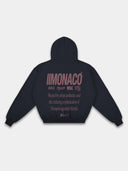 Navy streetwear hoodie back mockup by Monaco with burgundy logo stack, statement text and hood.