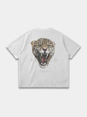 Arctic white Untamed Tee, back mockup with oversized snarling leopard artwork and spaced Monaco lettering.