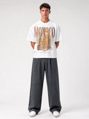 Arctic white Monaco Backroads paneled tee worn by model, front view with western roadside artwork.