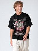 Black Monaco Good Times paneled tee worn by model, angled front view with eagle and country heritage graphic.