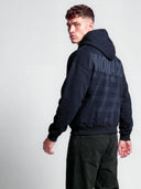 Monaco Aesthetic navy tapered hoodie on model, three-quarter back view with tonal dark typography and logo print.