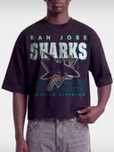 Black Sharks vintage boxy tee on model, front view with San Jose shark logo and teal lettering.