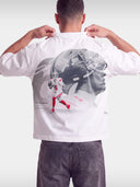 White No. 6 Next Chapter boxy tee worn by model, back view with football helmet photo print.