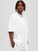 Model wearing white Monaco Social Club oversized tee with dropped shoulders