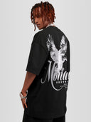 Model wearing black Monaco Social Club oversized tee with white eagle back graphic