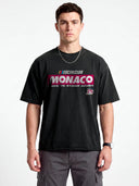 Faded black Monaco Sponsor raw hem tee on model, front view with red Monaco logo and No. 35 chest graphic.