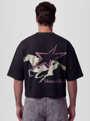 Male model wearing the Stallion Heavyweight Boxy Tee with galloping horse and Monaco star graphic — Monaco Social Club streetwear