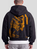 Model wearing the Racer No. 81 Heavyweight Full-Zip Hoodie in Faded Black with papaya-orange racing driver graphic — Monaco Social Club streetwear