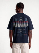 Navy blue Monaco Champ oversized tee worn by model, back view with multicolor typography and crest artwork.
