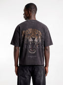 Dark grey Untamed Tee worn by model, back view highlighting the brown leopard head and Monaco lettering.