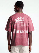 Faded Merlot Open Land heavyweight t-shirt worn by model, back view with white horses and large Monaco graphic.