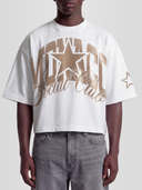 Model wearing the Varsity Heavyweight Boxy Tee in White with arched Monaco varsity graphic and sleeve star detail — Monaco Social Club streetwear
