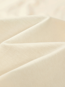 Heavyweight 100% cotton knit texture of the Monaco Boxy tee in ivory.