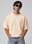 Monaco Soft Ivory heavyweight boxy tee, oversized drop-shoulder front view on model
