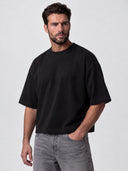 Monaco black heavyweight boxy tee, oversized drop-shoulder front view on model