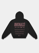 Monaco black athleisure hoodie mockup, back view with burgundy branding and layered statement print.