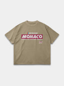 Khaki Monaco Sponsor heavyweight tee, front mockup with bold Monaco racing logo and small No. 35 graphic.