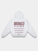 Heather gray streetwear hoodie mockup with burgundy oversized Monaco branding and statement graphic across the back.