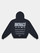 Navy Monaco athleisure hoodie back mockup with light grey logo stack, lifestyle typography, hood and ribbed hem.