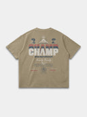 The Champ Tee in khaki, back mockup showing oversized red, navy and cream typography with Monaco crest.