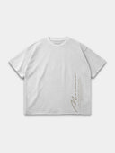 Arctic white Untamed raw hem T-shirt, front mockup with beige Monaco signature and vertical motto.