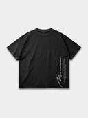 Faded black Untamed raw hem T-shirt, front mockup with beige Monaco signature and vertical motto.