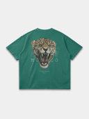 Vintage green Untamed oversized tee, back mockup with a large snarling leopard graphic and Monaco lettering.