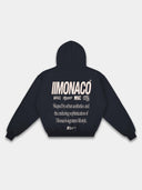 Navy Monaco pullover hoodie back mockup with cream logo stack, statement print and ribbed waistband.