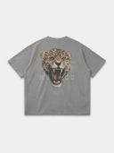 The Untamed Tee in light grey, back mockup with oversized leopard head graphic and Monaco lettering.