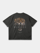 Dark grey Untamed Tee, back mockup with a large brown snarling leopard graphic and Monaco wordmark.