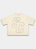 Ivory Club boxy tee by Monaco, front view with faded beige SC monogram and star graphic.