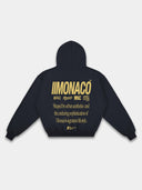 Monaco Aesthetic navy hoodie back mockup with gold typography, stacked logos and ribbed hem.