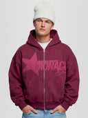 Men model wearing the Monaco Dept. Heavyweight Full-Zip Hoodie in color merlot — Monaco Social Club streetwear.