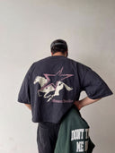 Male model wearing the Stallion Heavyweight Boxy Tee with galloping horse and Monaco star graphic — Monaco Social Club streetwear